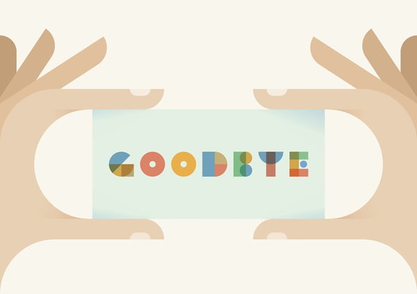 Human hands holding vintage card with Goodbye text