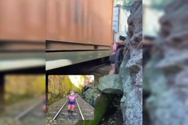 Vídeo ciclista quase atropelada por trem ‘Poderia ter me partido’
