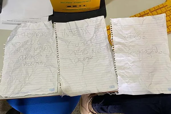 Mensagens racistas escritas em caderno de aluna de Curitiba