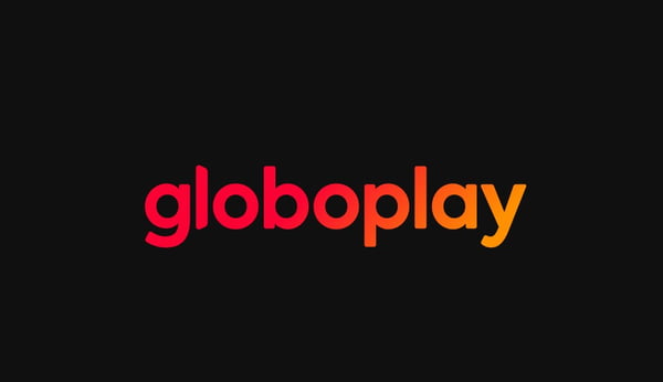Logo da Globoplay, nas cores vermelho e laranjado, em cima de um fundo preto- Metrópoles