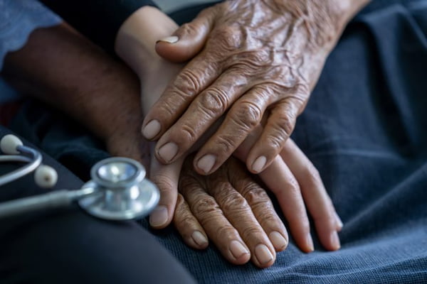 Color image of hands on top of each other