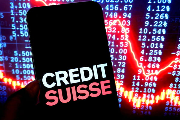 In this photo illustration, a Credit Suisse logo is seen