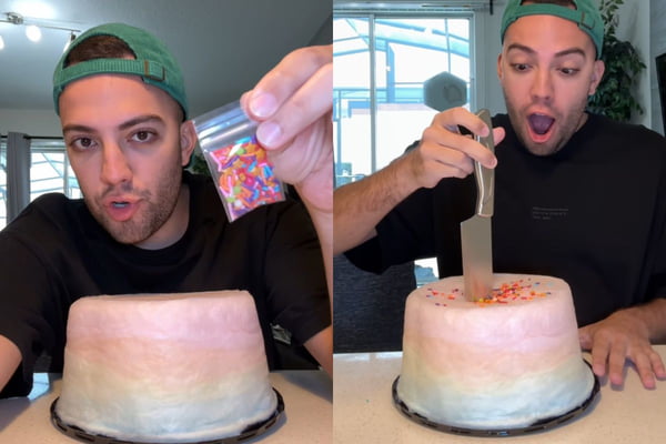 Foto colorida de um homem com bolo de algodão doce - Metrópoles