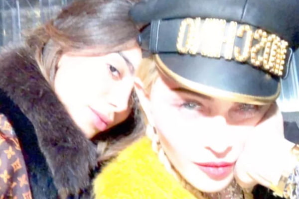 Foto colorida de Anitta e Madonna - Metrópoles