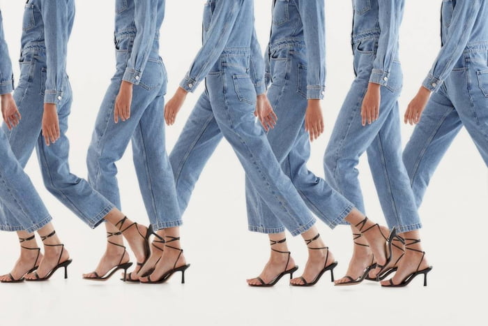 Modelo em versões repetidas usa calça jeans - Metrópoles