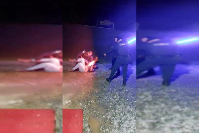 Policial atira contra homem caído no chão
