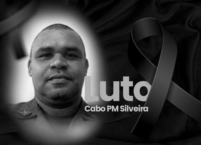 Imagem em preto e branco do rosto com PM Silveira, que foi morto em Santos - Metrópoles
